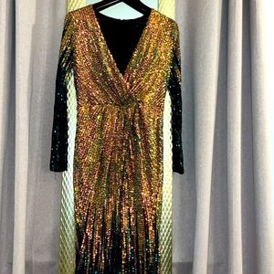 Elegant party dress, size XL, back zipper , leg opening at the front. Price 50.